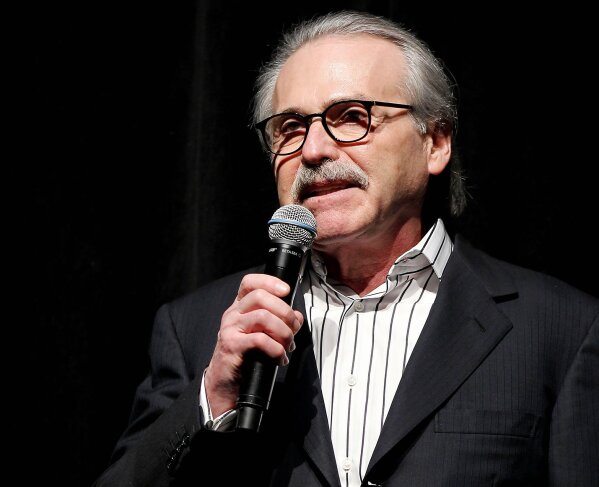 In this Jan. 31, 2014 photo, David Pecker, Chairman and CEO of American Media, addresses those attending the Shape & Men's Fitness Super Bowl Party in New York. (Marion Curtis via AP)